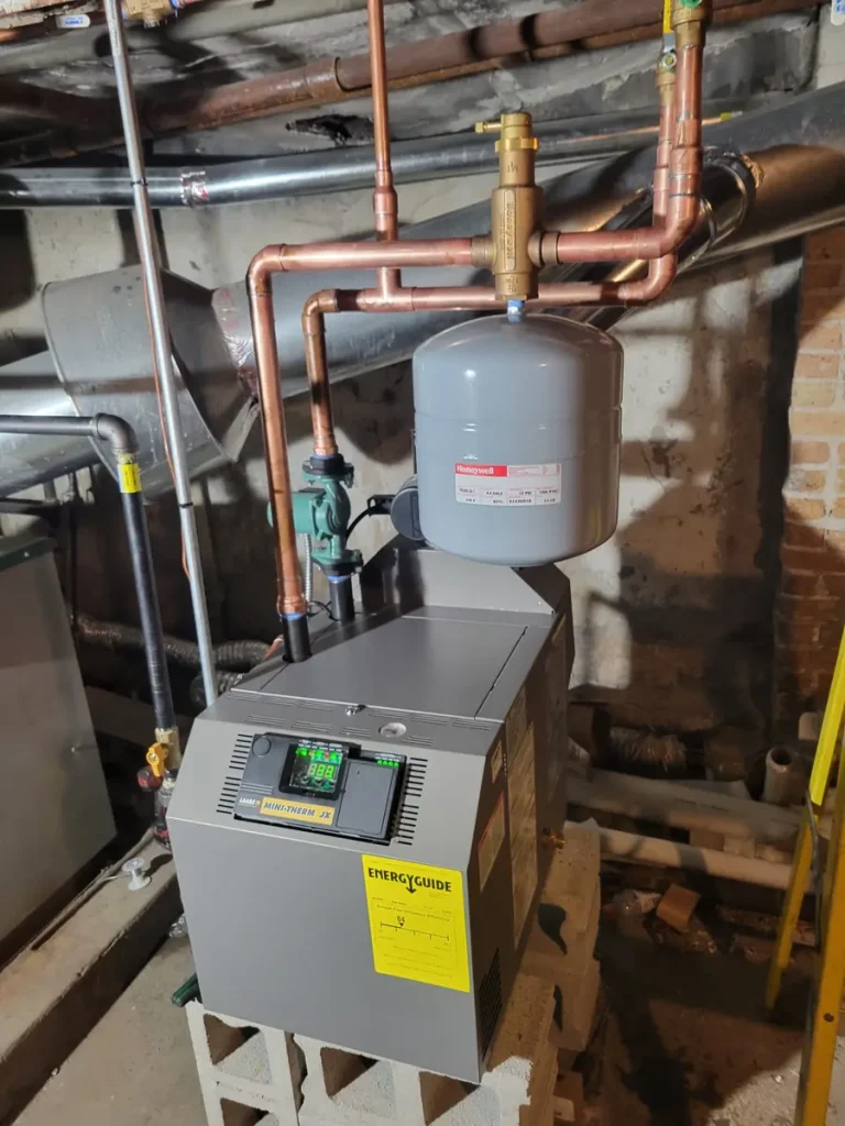 A boiler Diego installed, with new copper piping