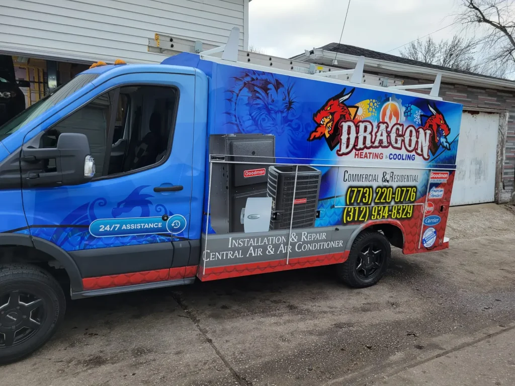 The wrapped Dragon Heating and Cooling van parked on a street